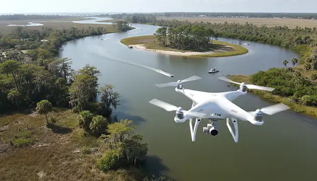 dji phantom 3 drone flying over florida river